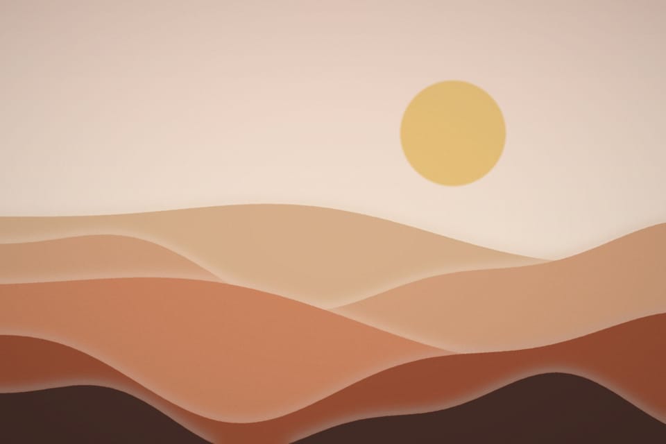 Layered terracotta dunes under a pale sun